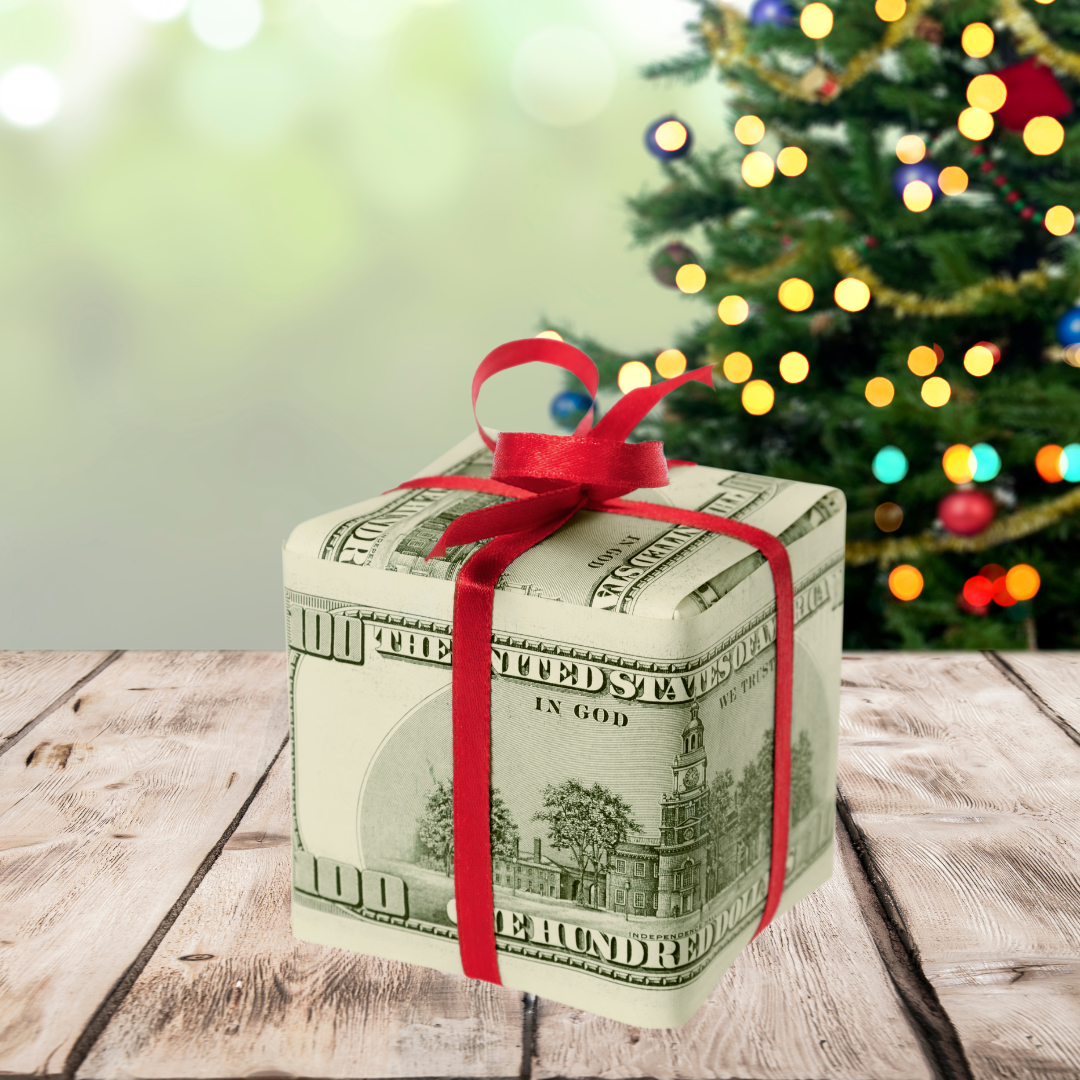 holiday image with money wrapped gift
